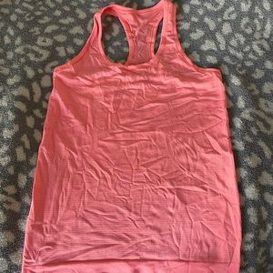 swiftly tech tank sunset orange